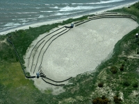 Silt fences used to restrict the amount ot tern nesting habitat on East Sand Is.
